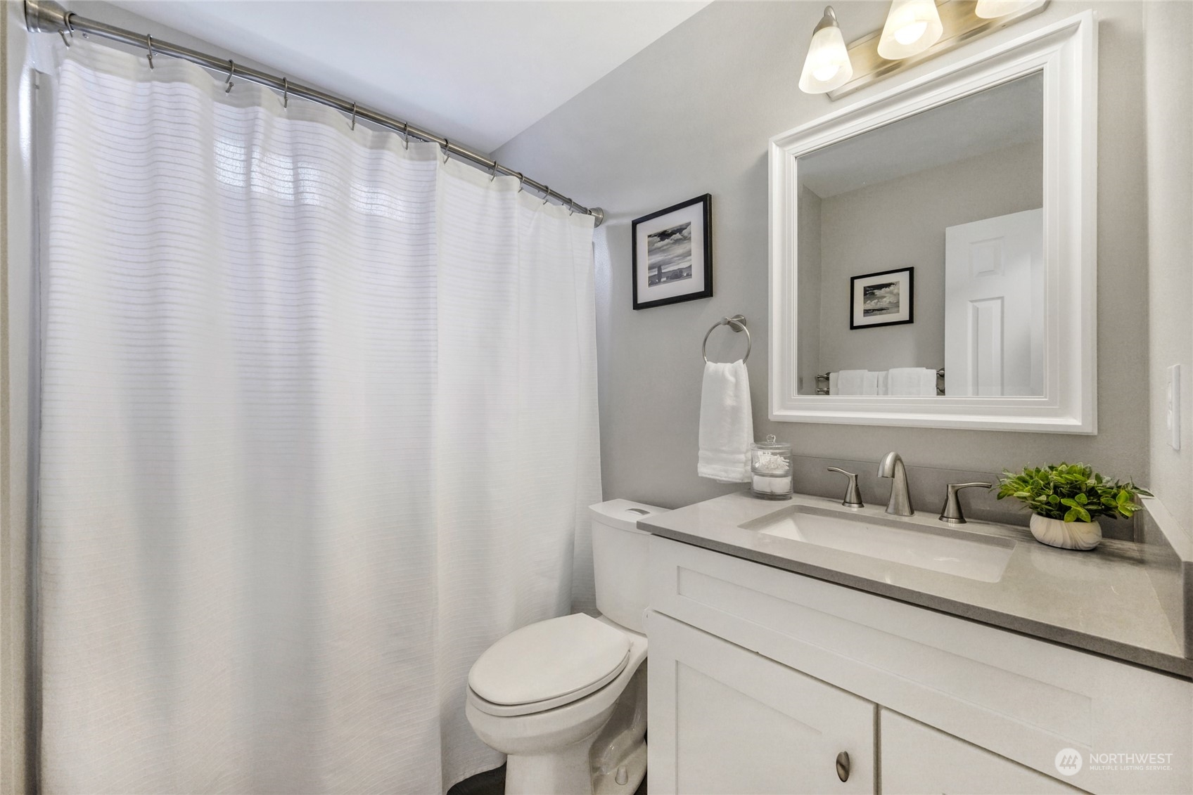 25323 Cromwell Road Monroe, WA 98272 - Photo 19 of 38 a bathroom with a granite countertop sink and a toilet