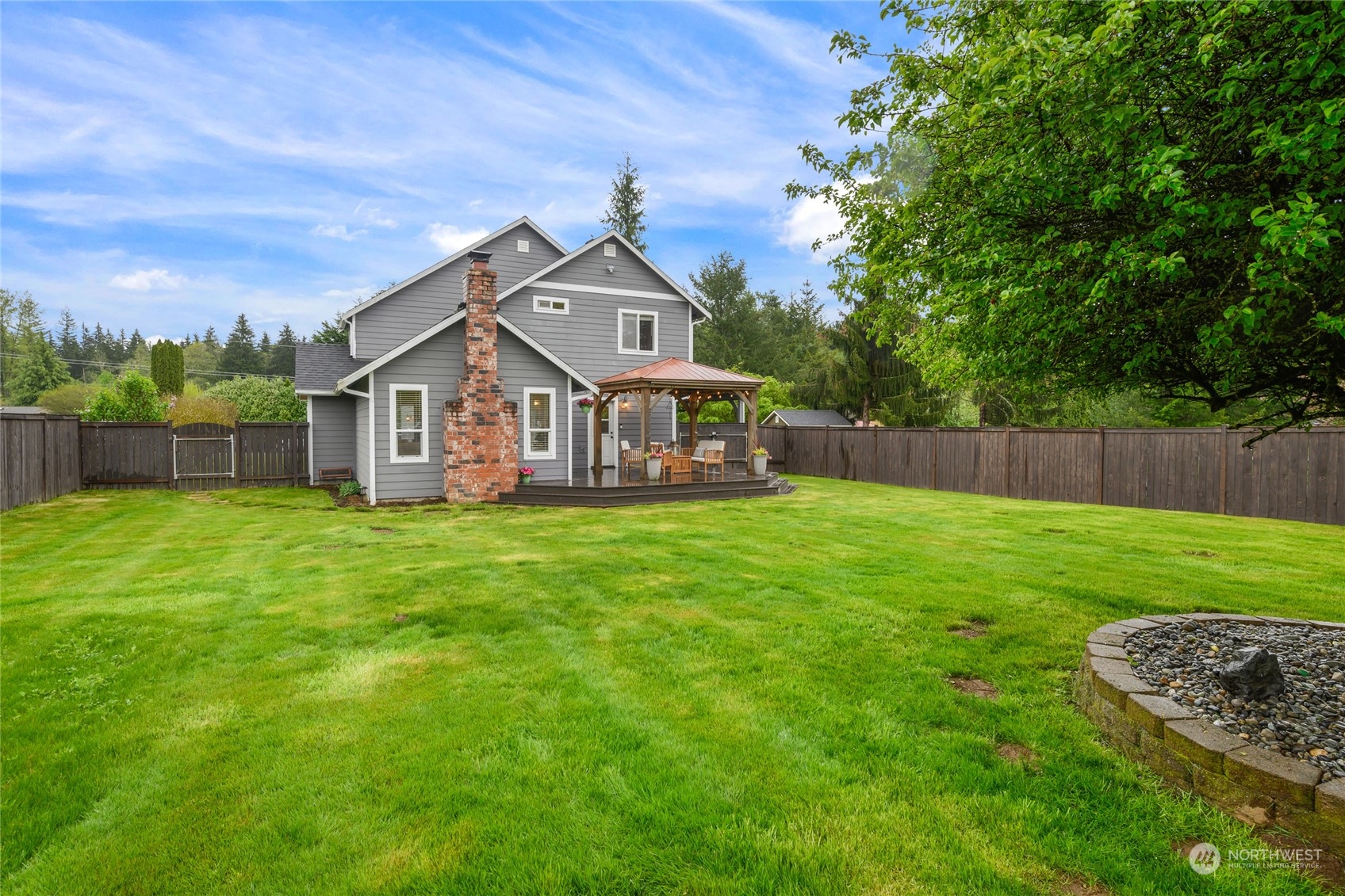 25323 Cromwell Road Monroe, WA 98272 - Photo 27 of 38 a front view of a house with a yard