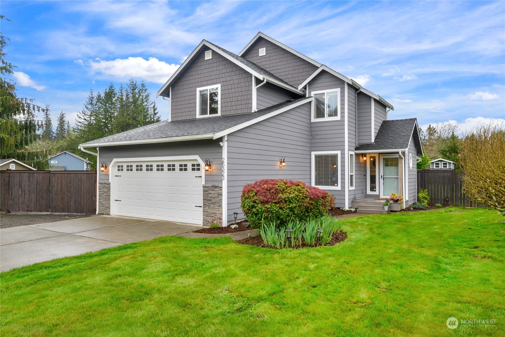 25323 Cromwell Road Monroe, WA 98272 - Photo 31 of 38 a view of a house with a yard and pathway