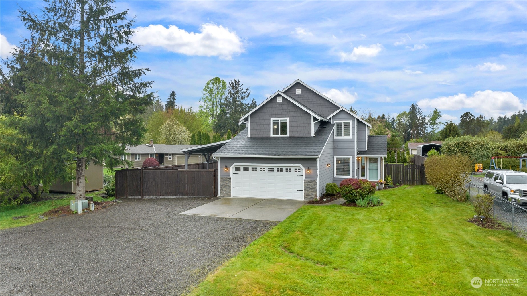 25323 Cromwell Road Monroe, WA 98272 - Photo 32 of 38 a front view of a house with garden