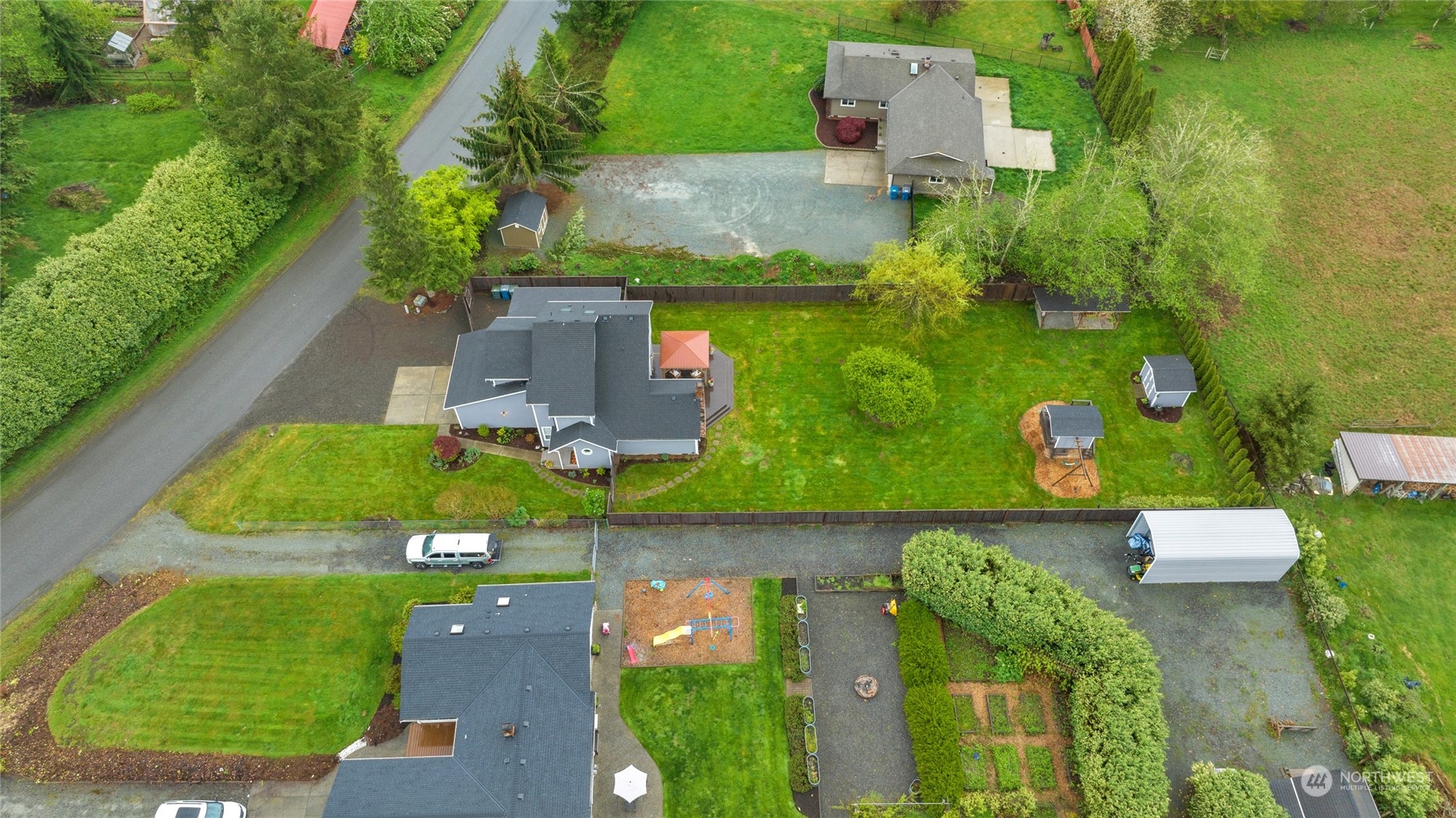 25323 Cromwell Road Monroe, WA 98272 - Photo 35 of 38 an aerial view of a house with a garden