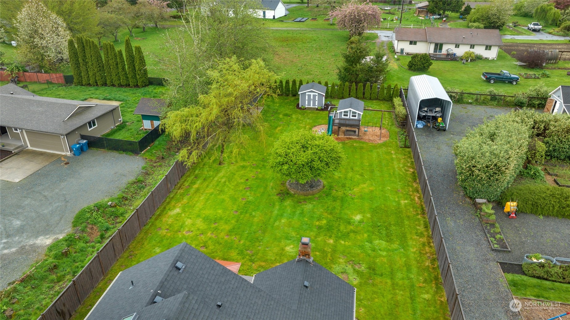 25323 Cromwell Road Monroe, WA 98272 - Photo 37 of 38 an aerial view of a house with a yard
