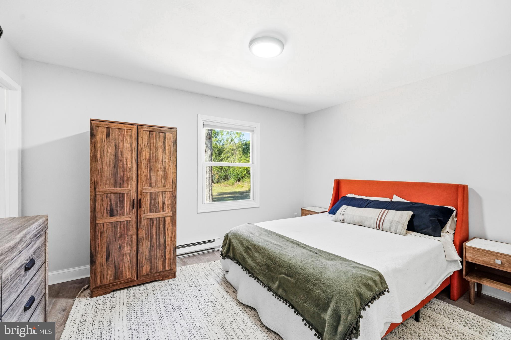 209 Myrtle Lane Berlin, NJ 08009 - Photo 16 of 36 a bedroom with a bed and a window