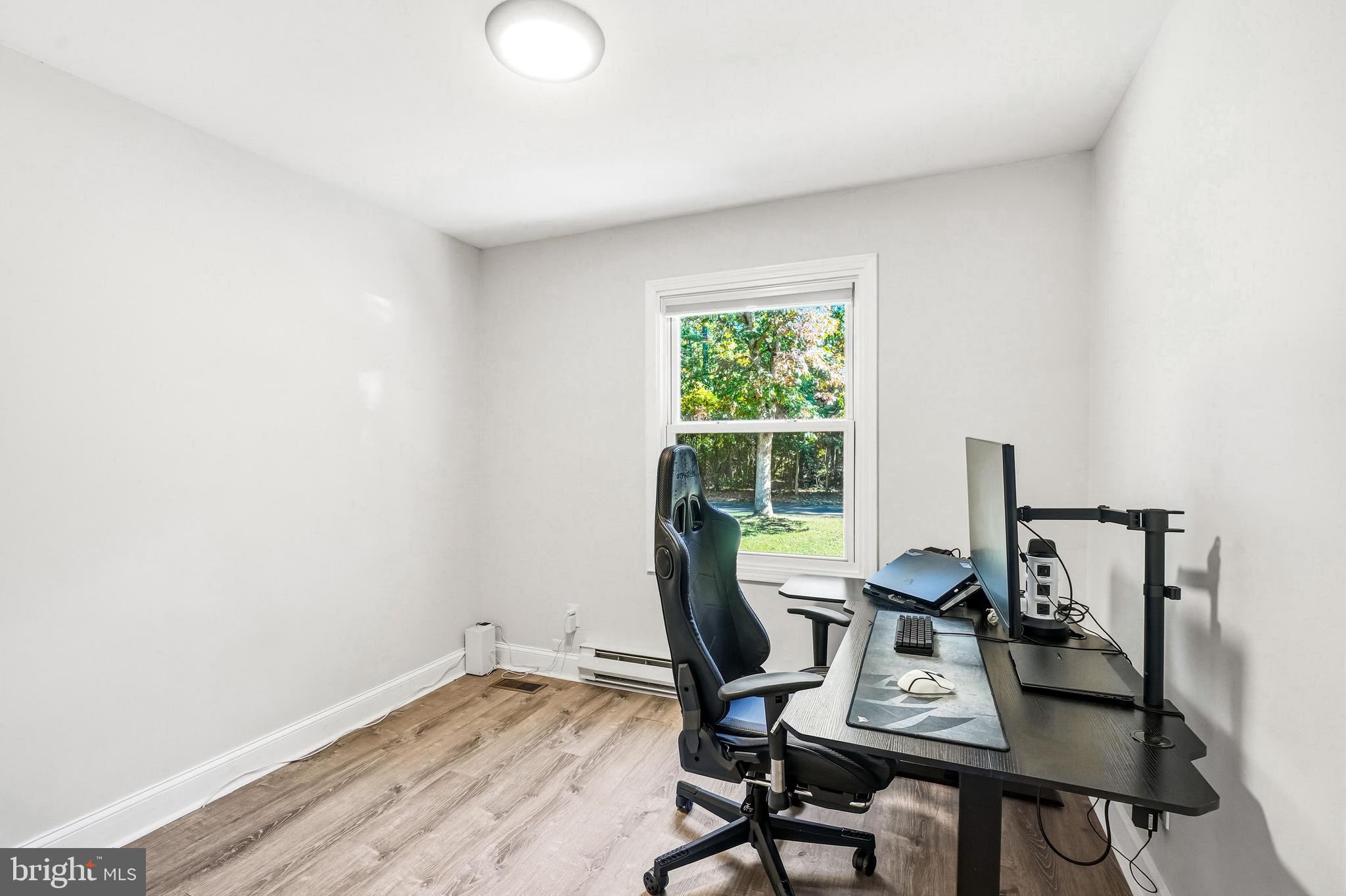 209 Myrtle Lane Berlin, NJ 08009 - Photo 17 of 36 a workspace with furniture and a window