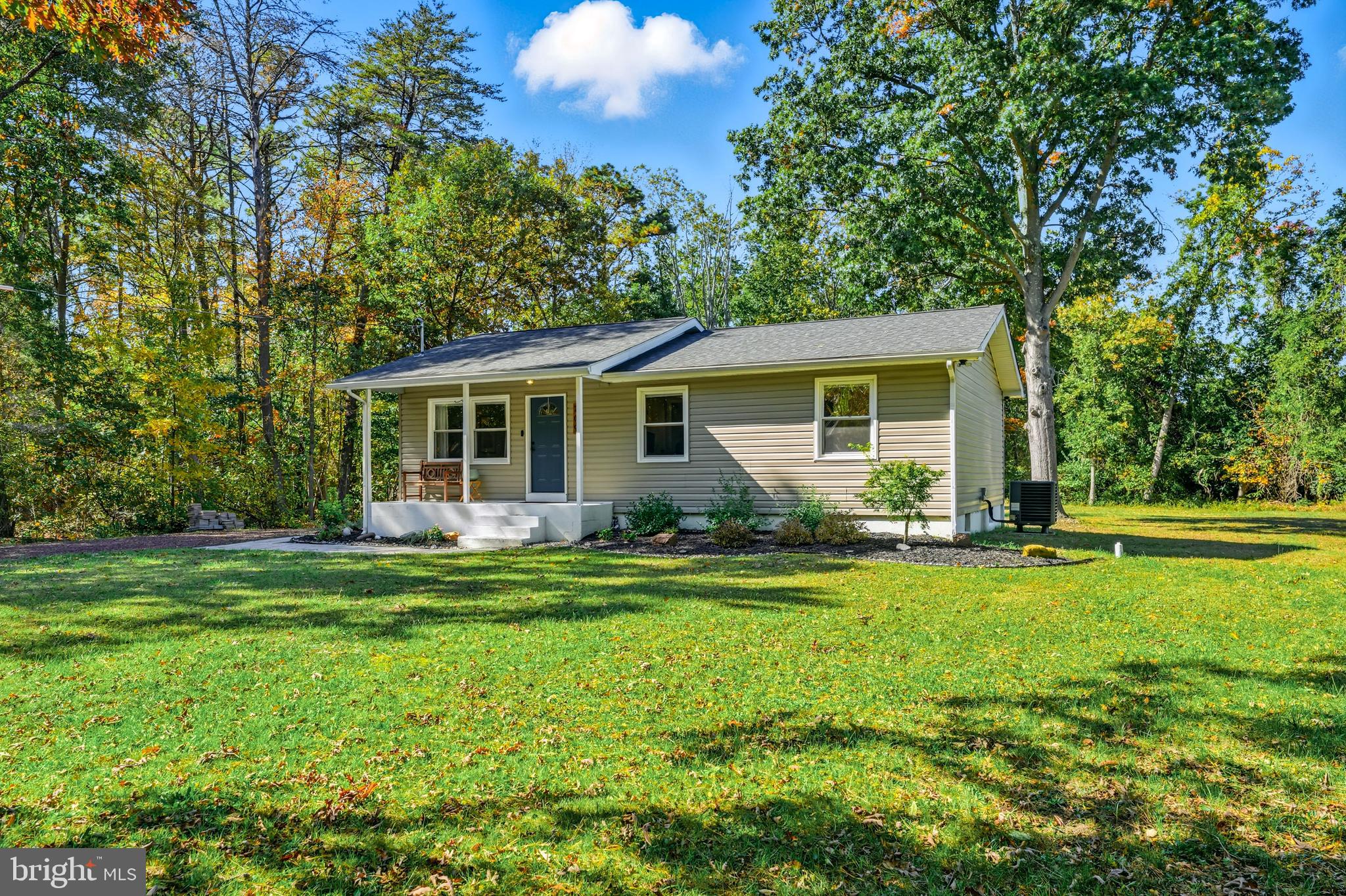 209 Myrtle Lane Berlin, NJ 08009 - Photo 2 of 36 a front view of house with yard and green space