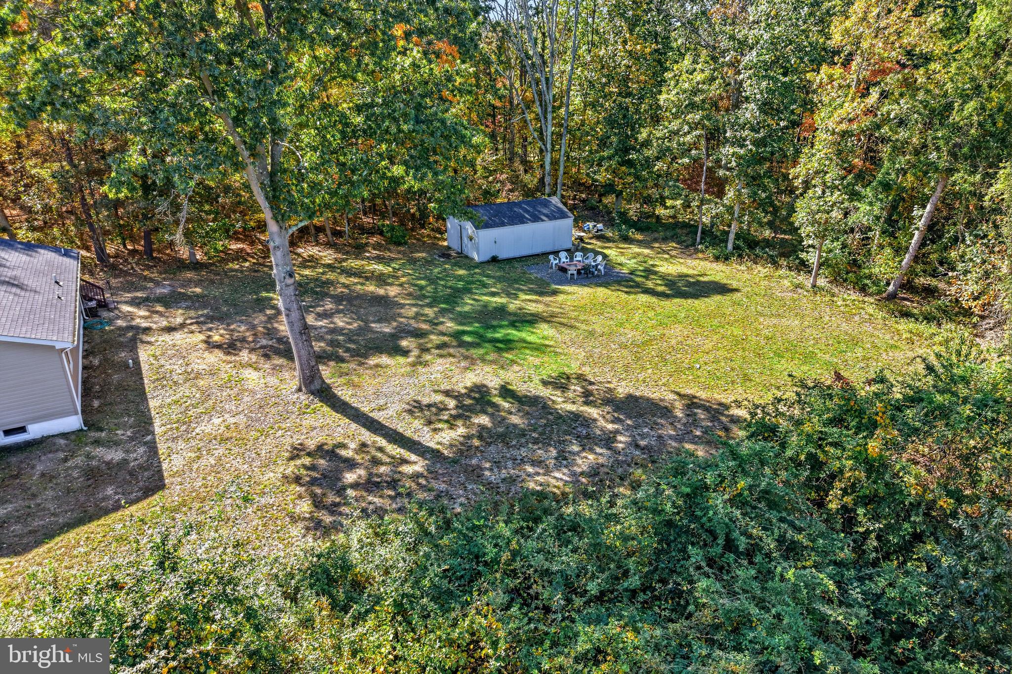 209 Myrtle Lane Berlin, NJ 08009 - Photo 28 of 36 a backyard of a house with lots of green space and shower