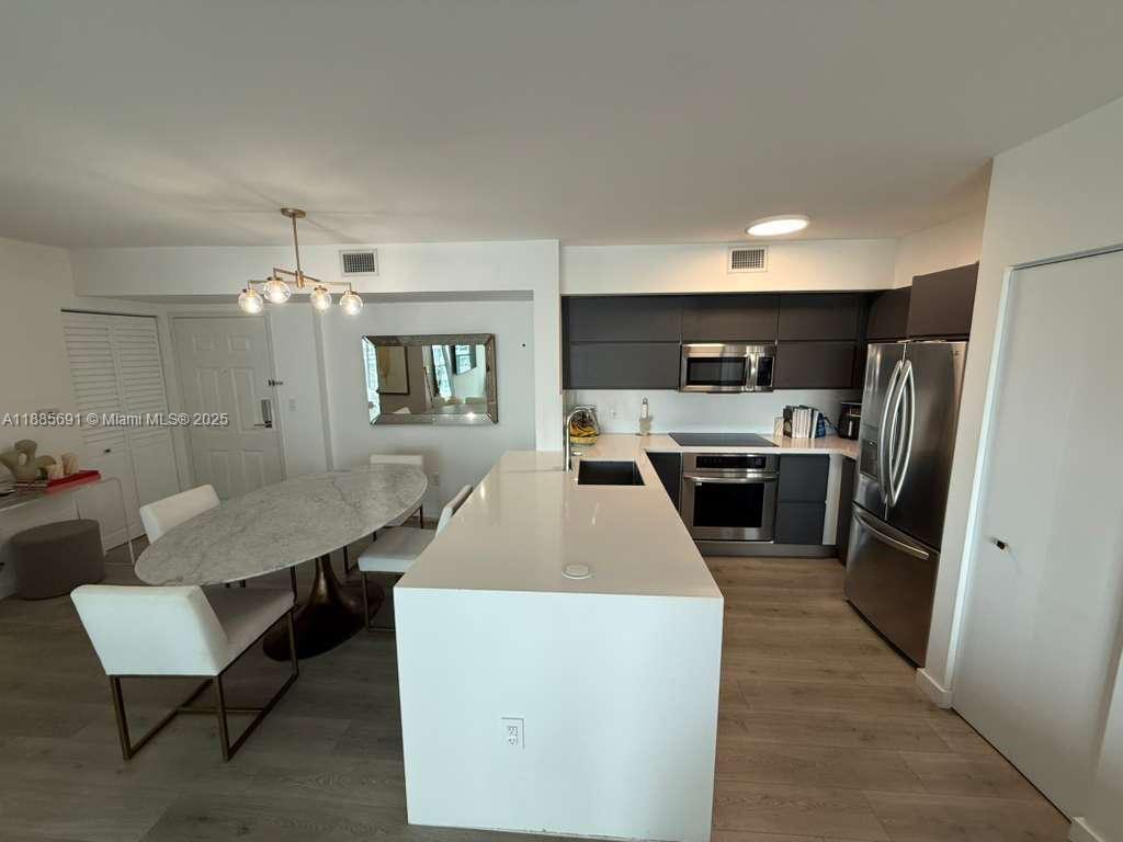 1155 Brickell Bay Drive, Unit 1408 Miami, FL 33131 - Photo 3 of 11