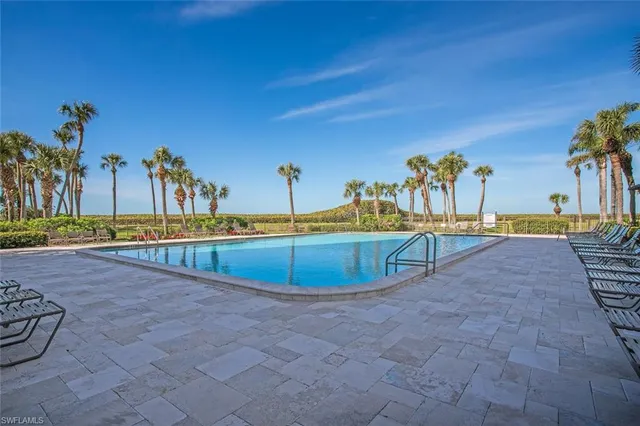 swimming pool with outdoor seating