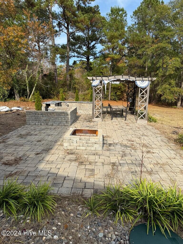 493 Highway 172 Hubert, NC 28539 - Photo 25 of 33 Outdoor Kitchen Firepit