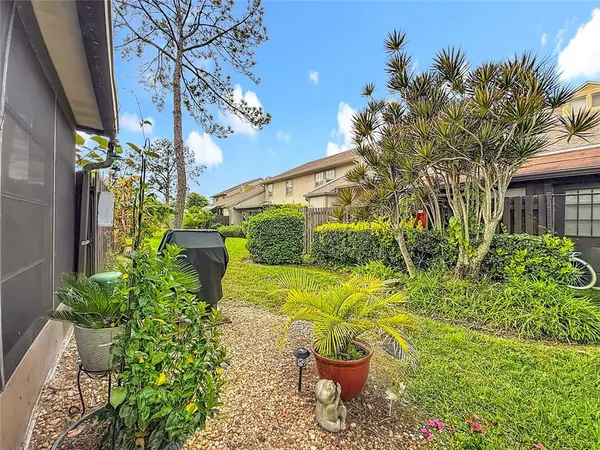 a view of balcony and yard