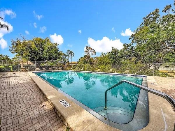 a front view of a house with swimming pool