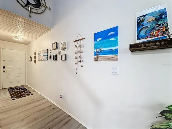 a kitchen with stainless steel appliances granite countertop a refrigerator and a stove