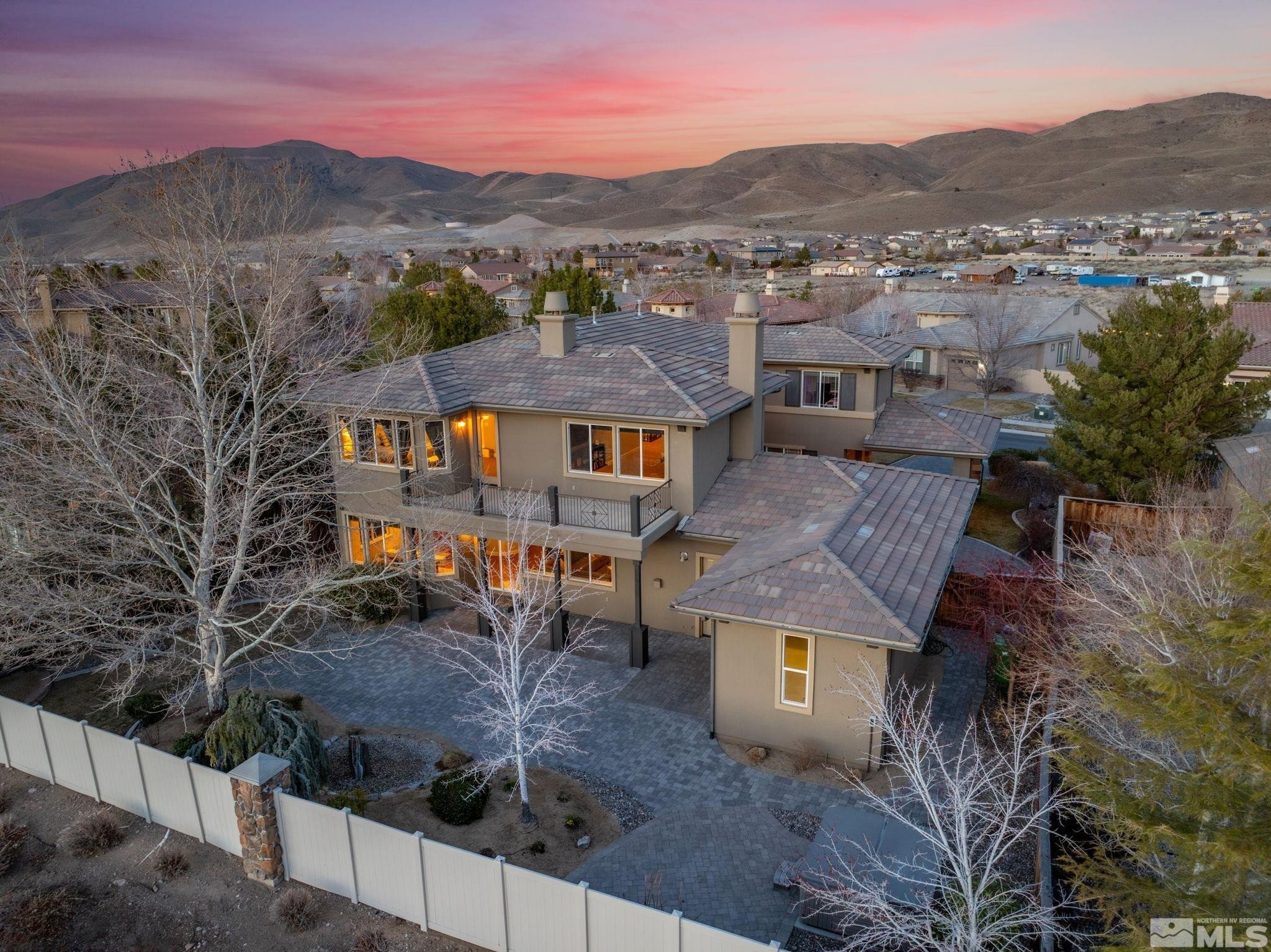 10135 Burghley Lane Reno, NV 89521 - Photo 36 of 39 a view of a town with mountains in the background