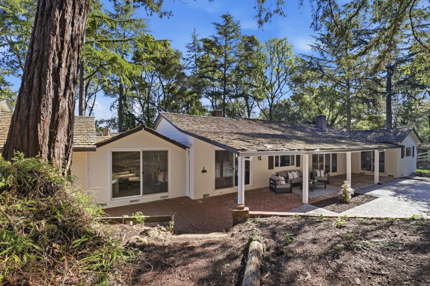 425 Summit Spring Road Woodside, CA 94062 - Photo 38 of 42 a house with trees in the background