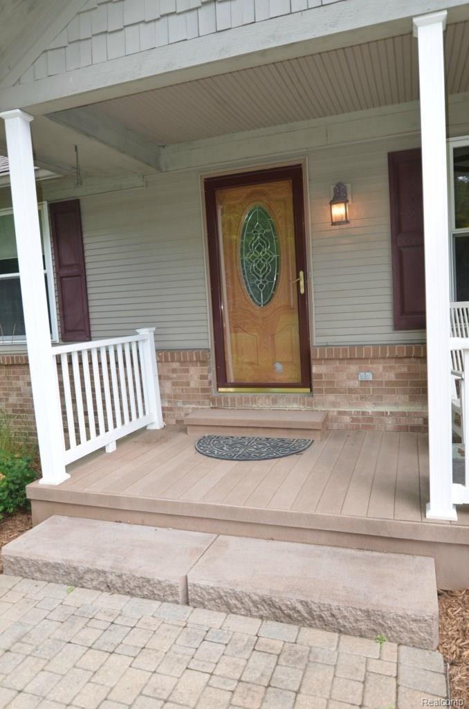 8620 Eaton Road Davisburg, MI 48350 - Photo 1 of 55 HANDSOME ENTRANCE WELCOMES FRIENDS