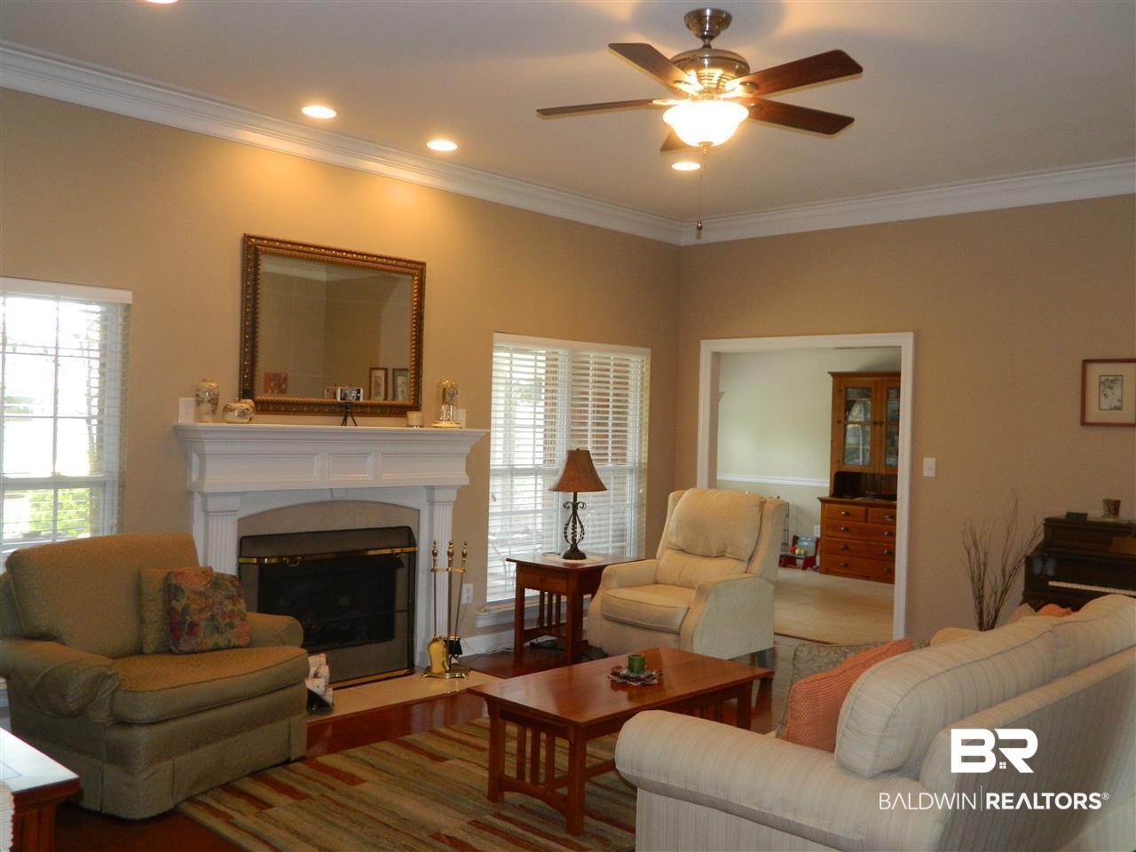 3990 Symphony Way West Semmes, AL 36575 - Photo 8 of 45 Recessed lighting and crown molding a plus.