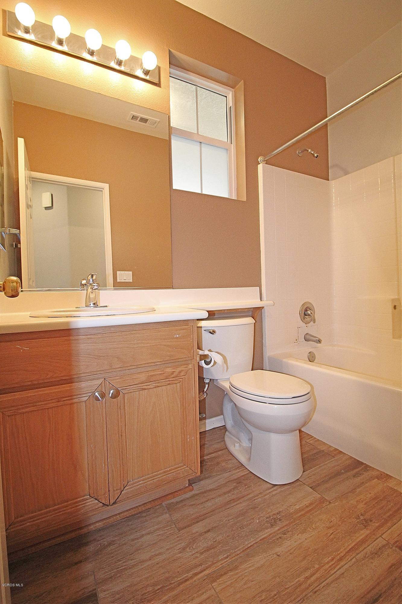 351 Huerta Street Oxnard, CA 93030 - Photo 6 of 18 a bathroom with a sink a toilet and shower