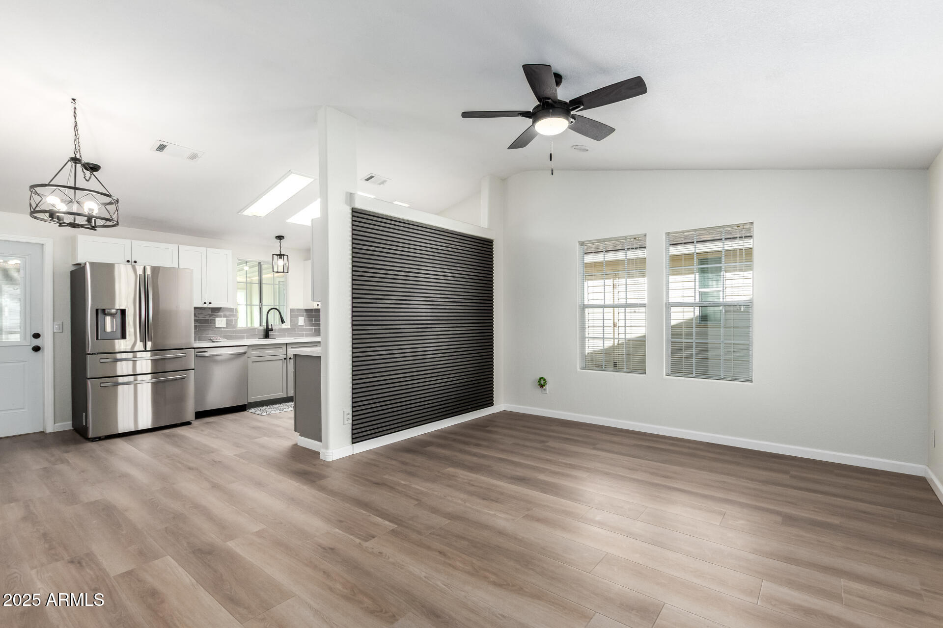 3301 South Goldfield Road, Unit 2006 Apache Junction, AZ 85119 - Photo 12 of 40 a view of a kitchen with a sink and stainless steel appliances