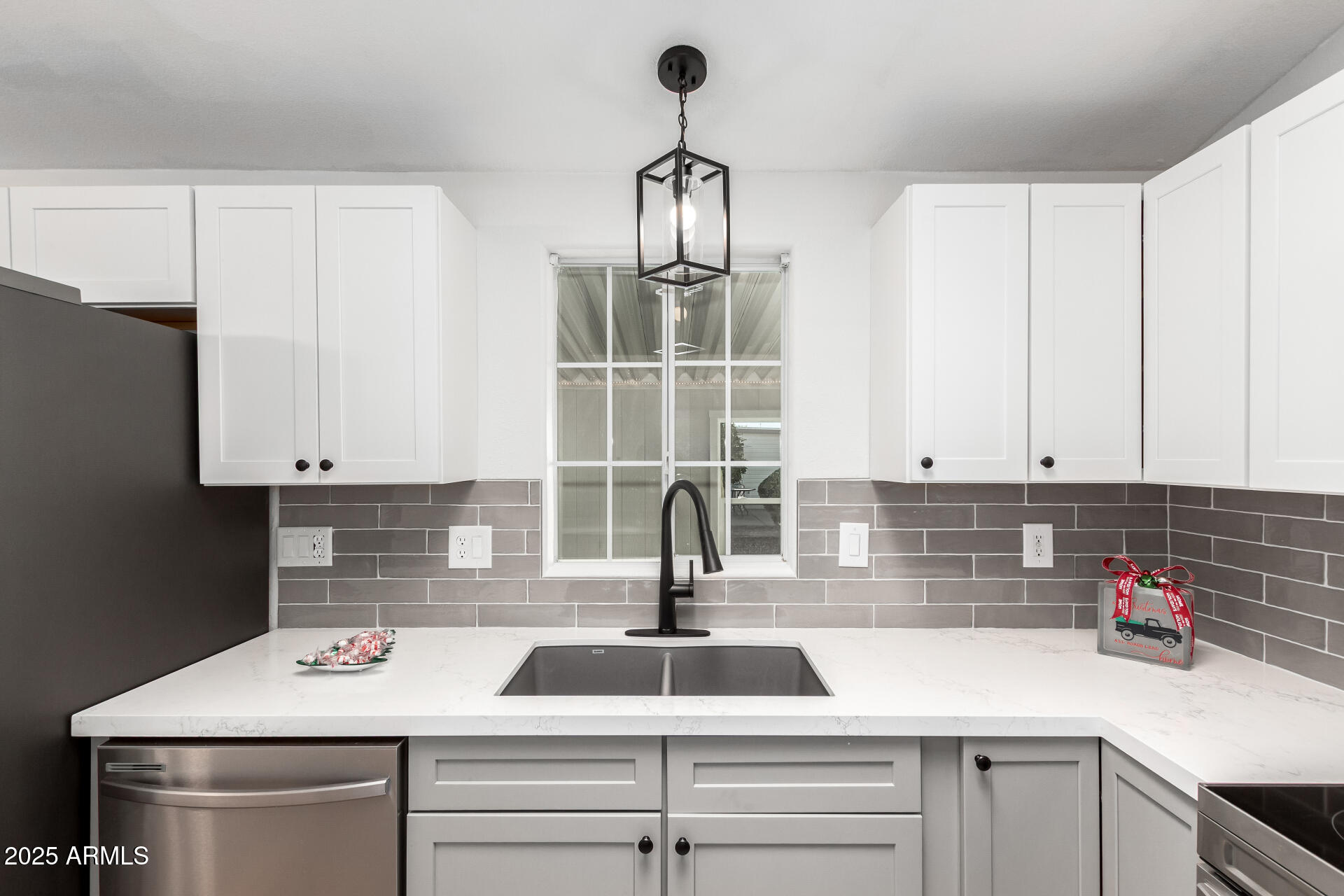3301 South Goldfield Road, Unit 2006 Apache Junction, AZ 85119 - Photo 17 of 40 a kitchen with a sink and cabinets