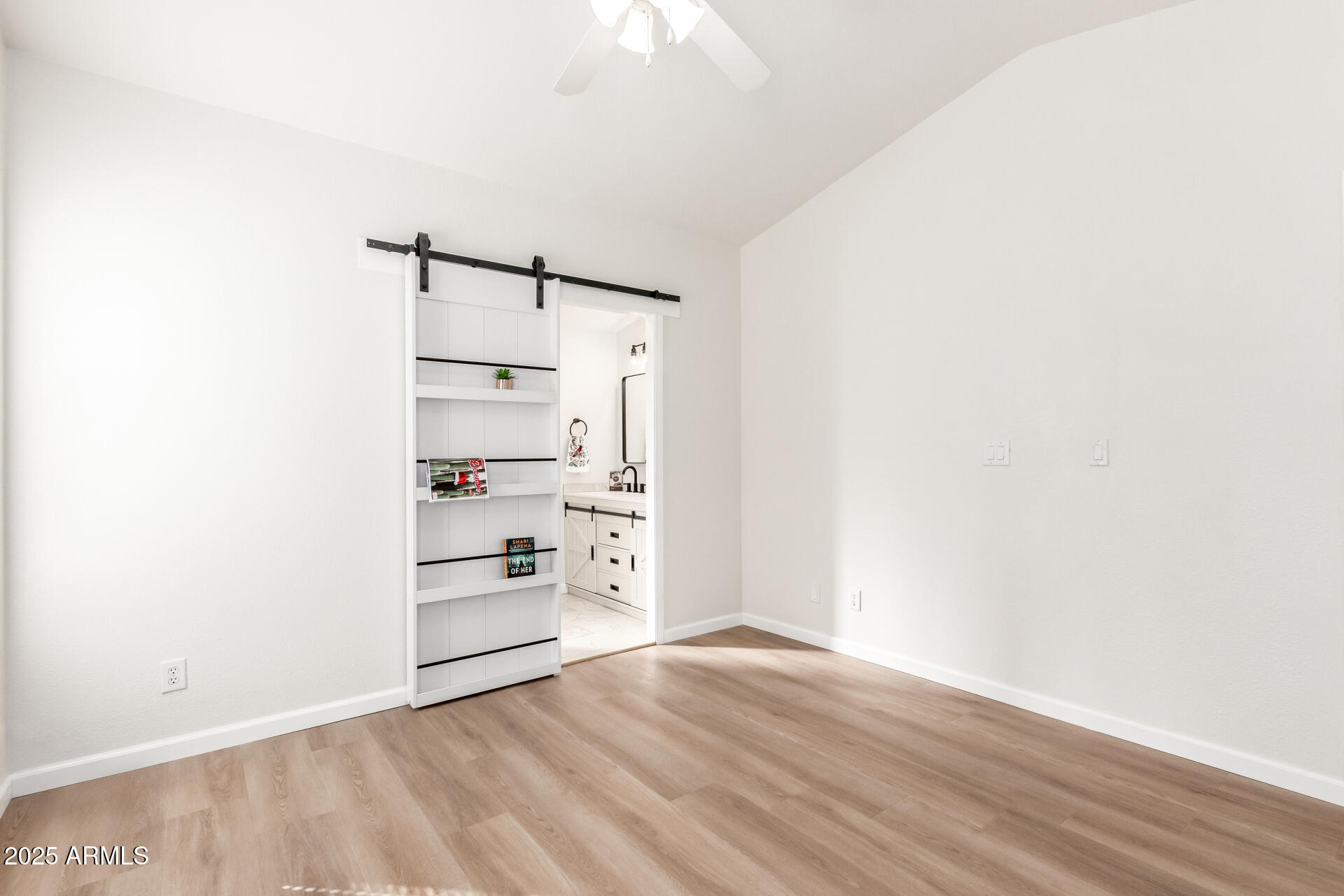 3301 South Goldfield Road, Unit 2006 Apache Junction, AZ 85119 - Photo 19 of 40 a view of a room with wooden floor