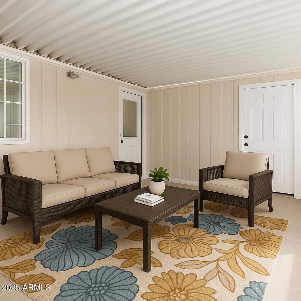 3301 South Goldfield Road, Unit 2006 Apache Junction, AZ 85119 - Photo 2 of 40 a living room with furniture and a rug