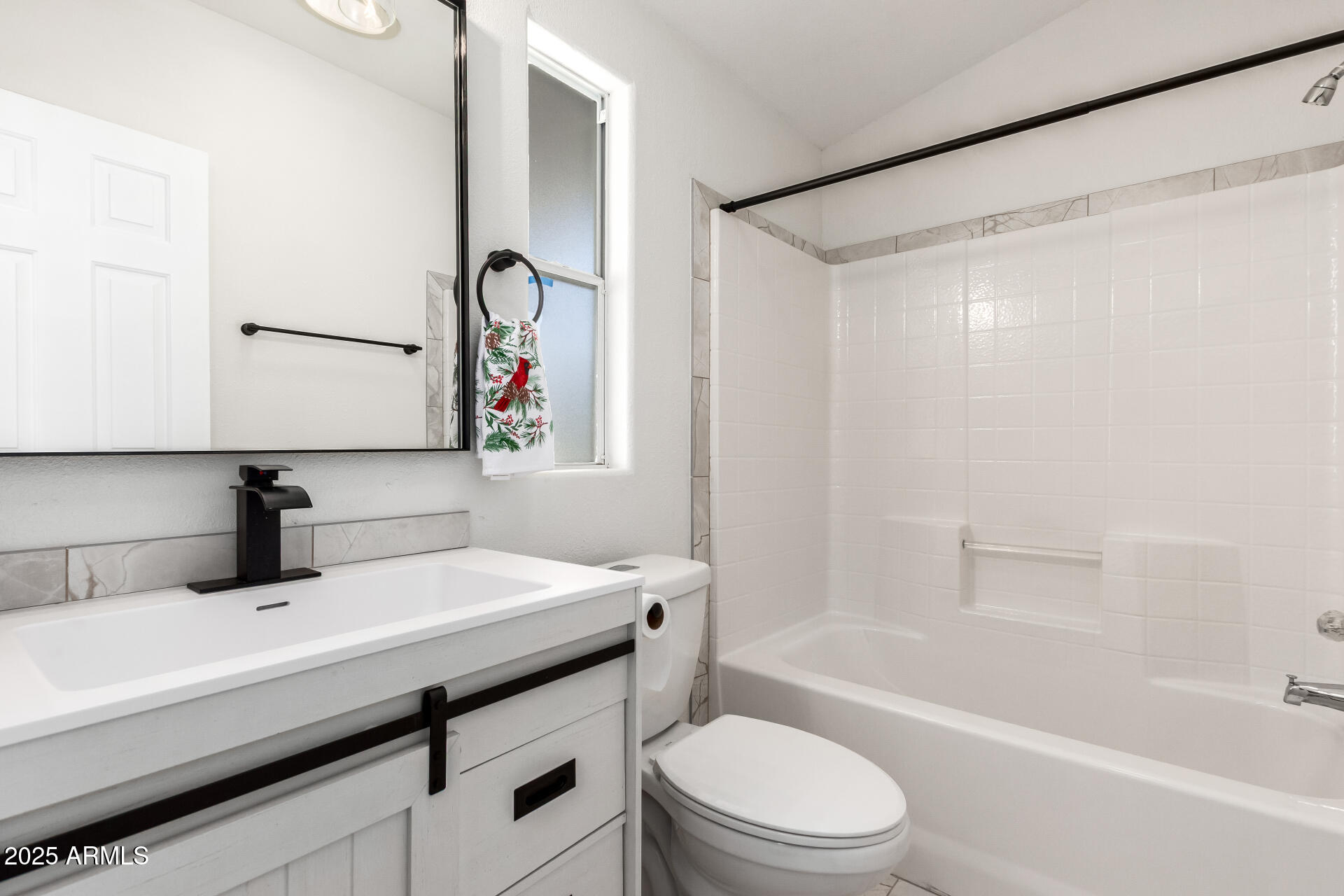 3301 South Goldfield Road, Unit 2006 Apache Junction, AZ 85119 - Photo 9 of 40 a bathroom with a sink toilet vanity and shower