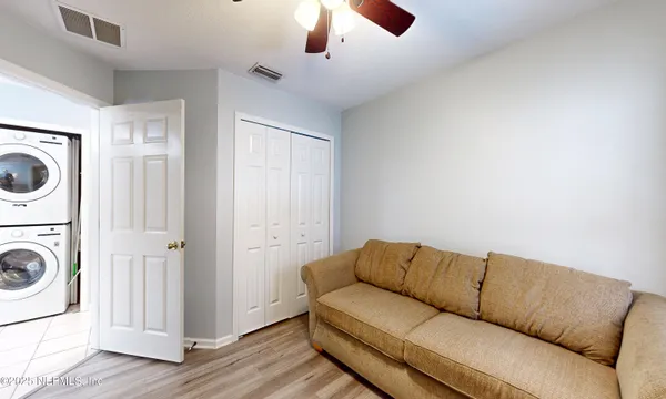 a bathroom with a sink toilet and mirror