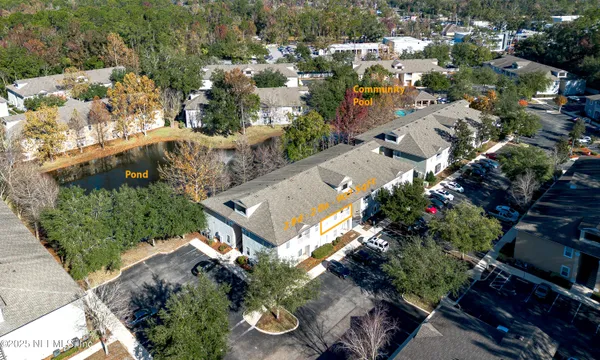 a view of a slide with trees in the background
