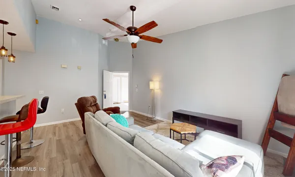 a kitchen with a sink and refrigerator