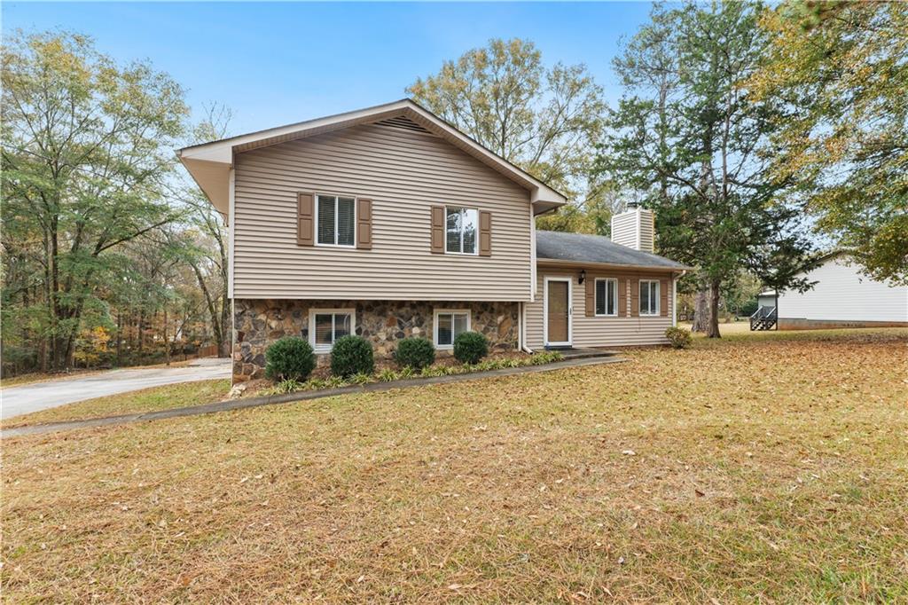 631 Rockaway Road Senoia, GA 30276 - Photo 1 of 1 a front view of a house with a yard