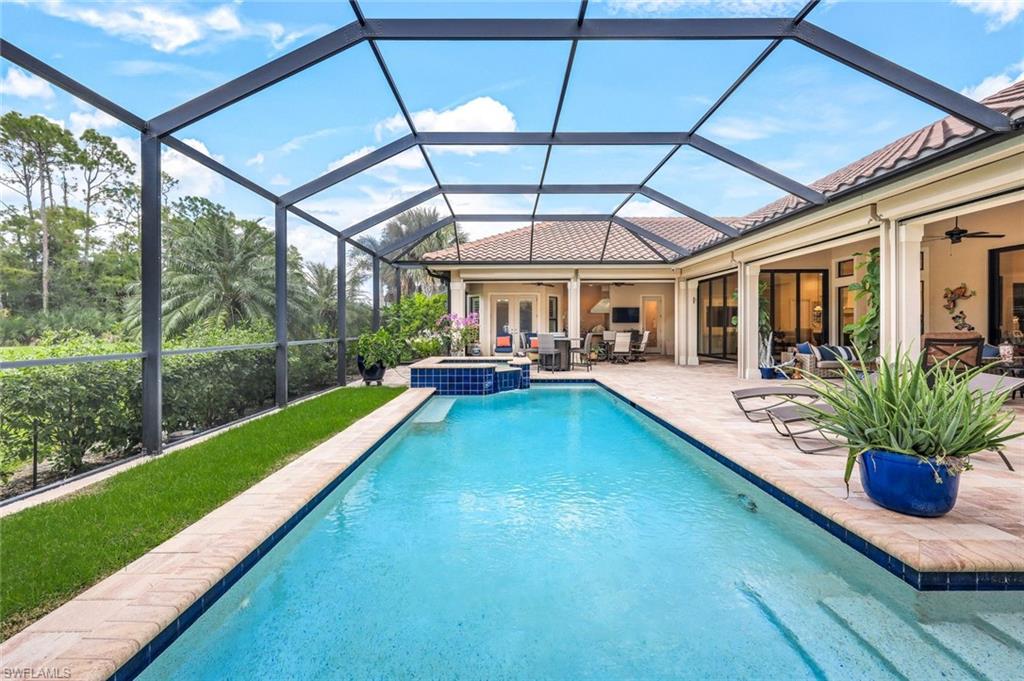 a swimming pool with a garden view