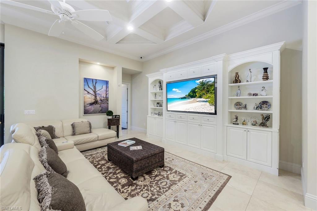 9243 Marble Stone Drive Naples, FL 34120 - Photo 17 of 50 a living room with furniture