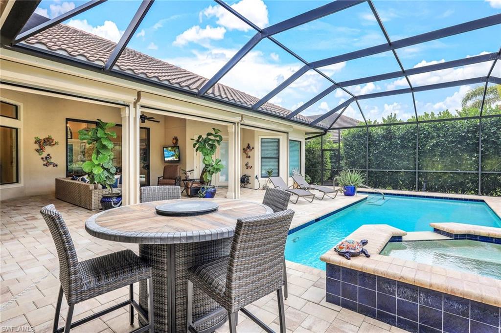 9243 Marble Stone Drive Naples, FL 34120 - Photo 42 of 50 a outdoor space with furniture