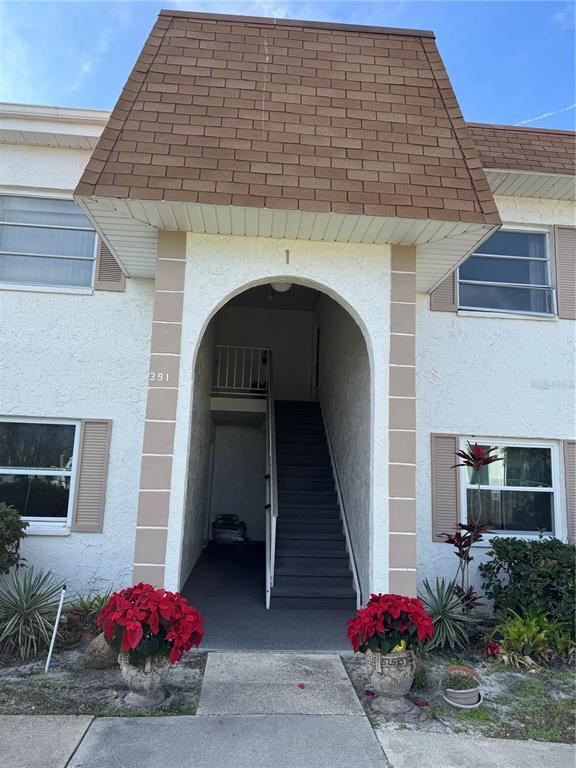 391 South McMullen Booth Road, Unit 7 Clearwater, FL 33759 - Photo 1 of 16 a front view of a house