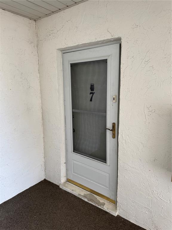 391 South McMullen Booth Road, Unit 7 Clearwater, FL 33759 - Photo 4 of 16 a view of entryway