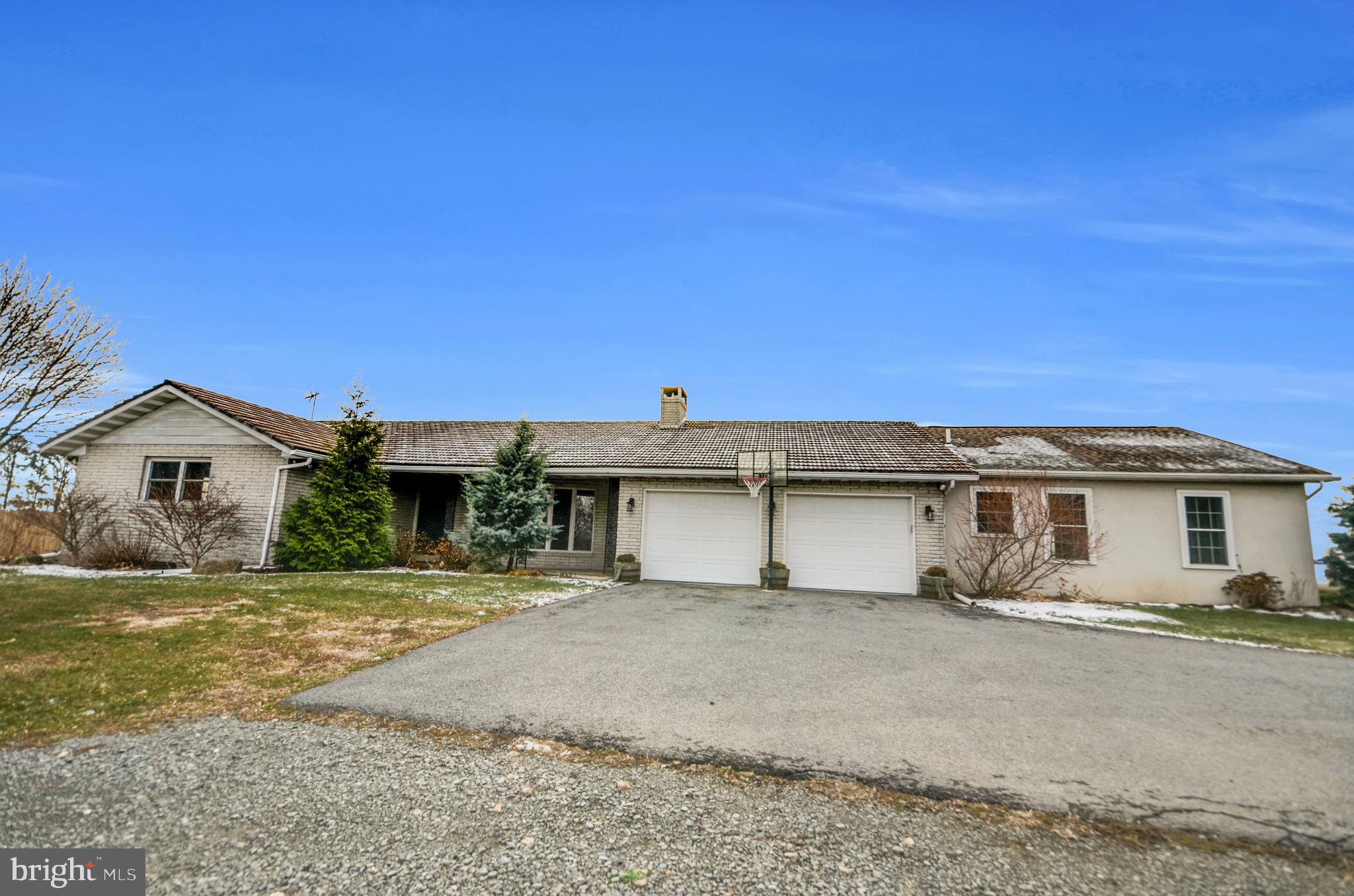 a house view with a garden space