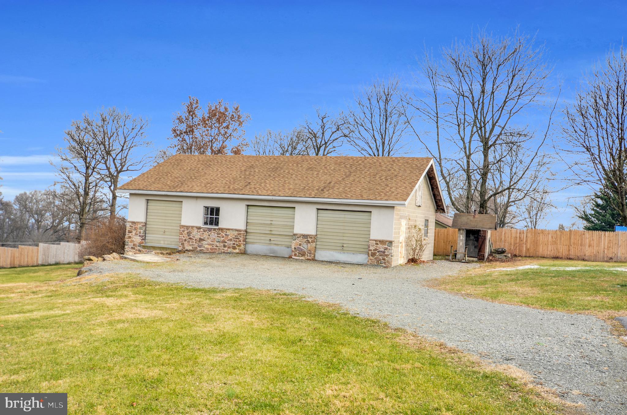 221 Hartman Road Reading, PA 19606 - Photo 4 of 29 a view of a house with a yard patio and fire pit