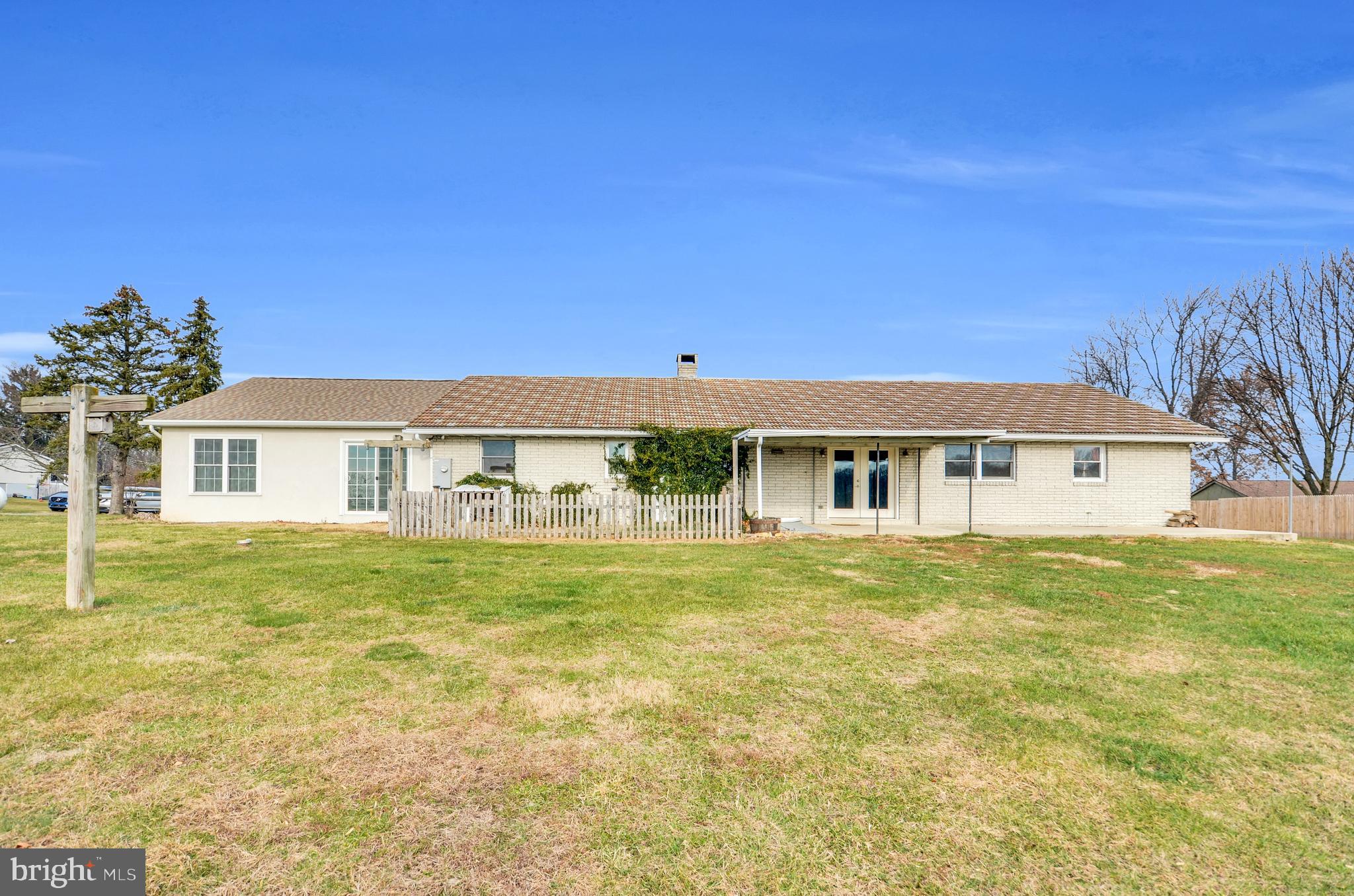 221 Hartman Road Reading, PA 19606 - Photo 5 of 29 a front view of a house with a garden