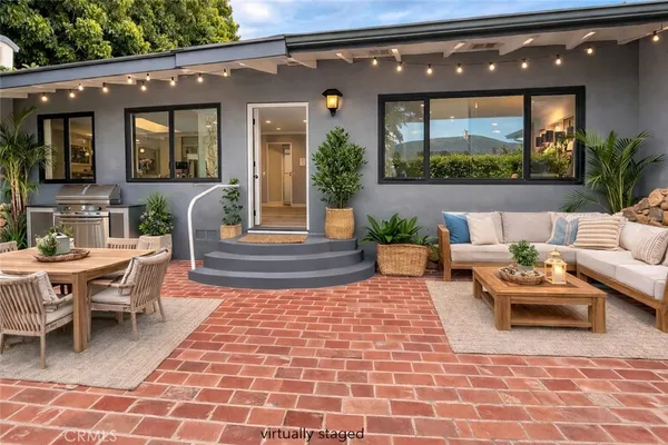 a outdoor space with lots of furniture and garden view