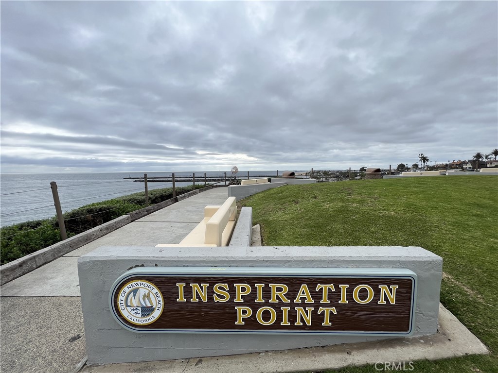 457 Seaward Road, Unit B Newport Beach, CA 92625 - Photo 13 of 16 a view of a street sign under a large building