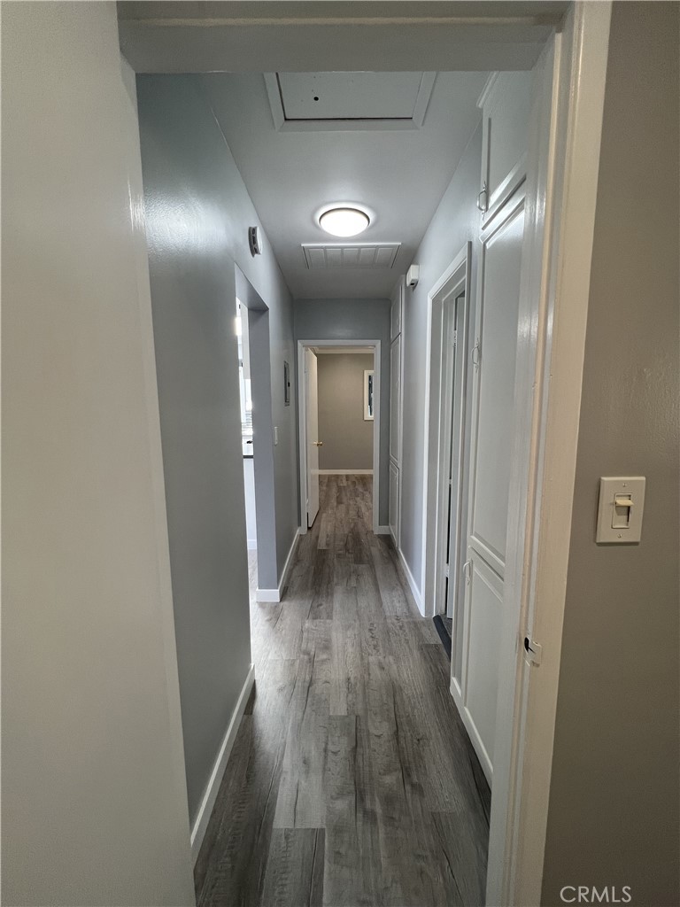 457 Seaward Road, Unit B Newport Beach, CA 92625 - Photo 8 of 16 a view of hallway with wooden floor