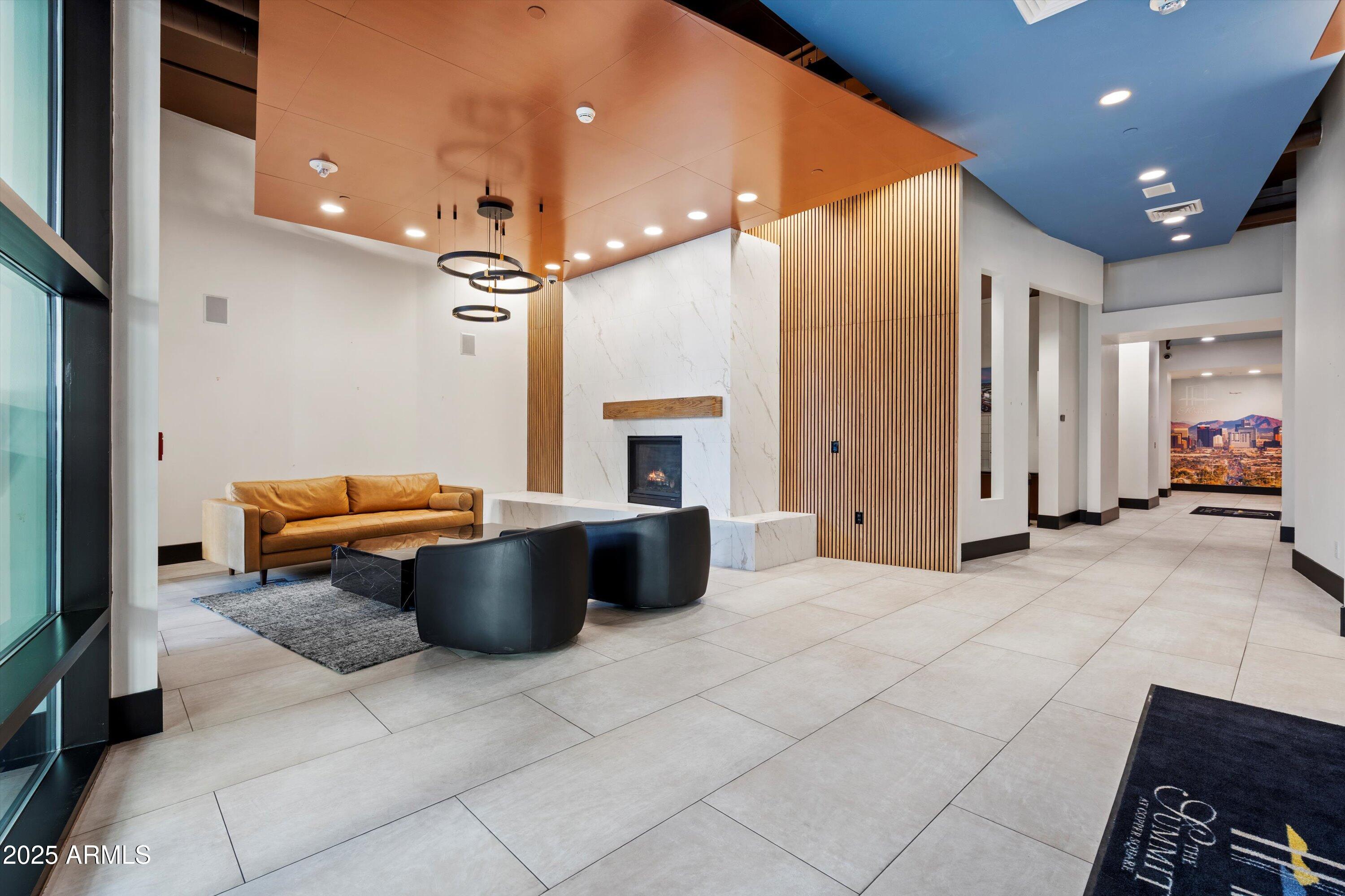 310 South 4th Street, Unit 601 Phoenix, AZ 85004 - Photo 22 of 32 a bathroom with a tub a toilet and a shower