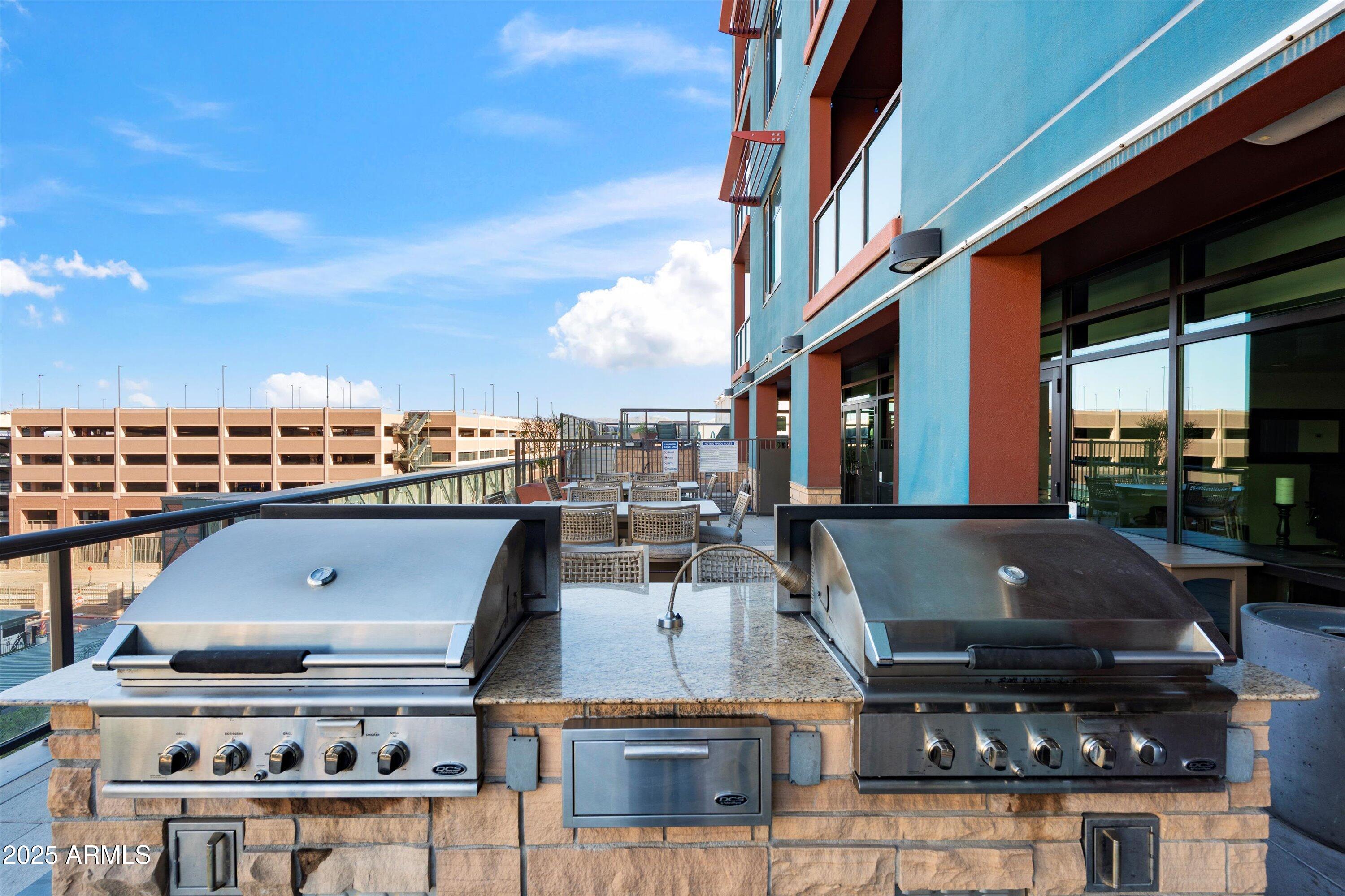 310 South 4th Street, Unit 601 Phoenix, AZ 85004 - Photo 29 of 32 a view of a building with many windows