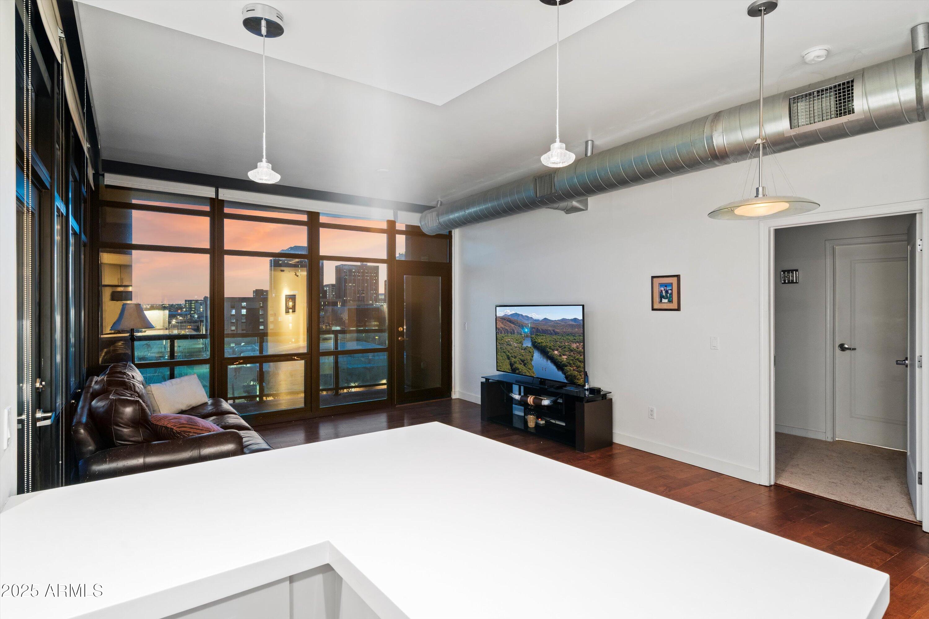 310 South 4th Street, Unit 601 Phoenix, AZ 85004 - Photo 6 of 32 a very nice looking room with a large window