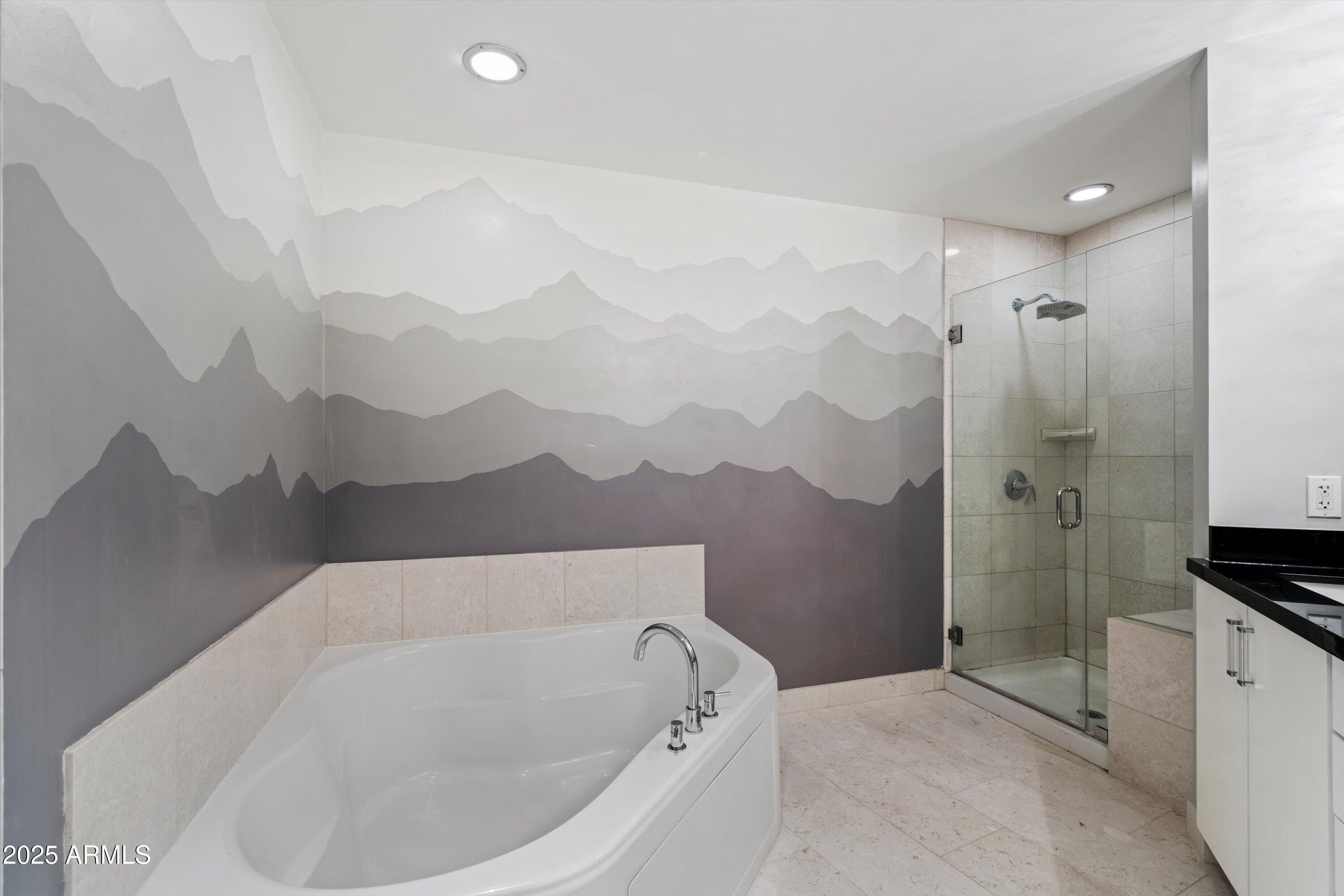 310 South 4th Street, Unit 601 Phoenix, AZ 85004 - Photo 9 of 32 a bathroom with a bathtub and shower