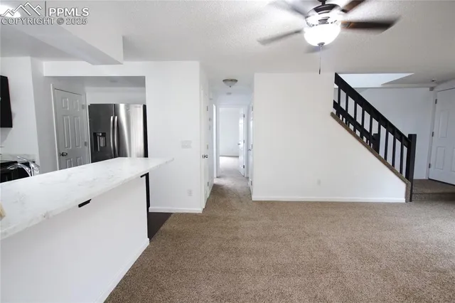 a view of livingroom with furniture and entryway
