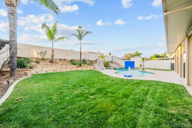 a view of a park with swings