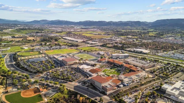 an aerial view of residential building and lake view
