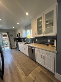 1437 4th Street Calistoga, CA 94515 - Photo 2 of 15 a kitchen with stainless steel appliances granite countertop a stove a sink and a microwave