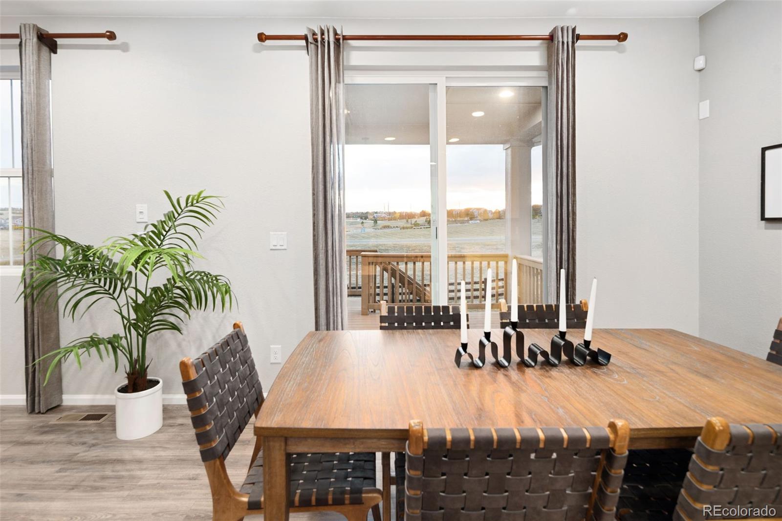 3957 Breakcamp Court Castle Rock, CO 80108 - Photo 18 of 50 a dining room with furniture and wooden floor